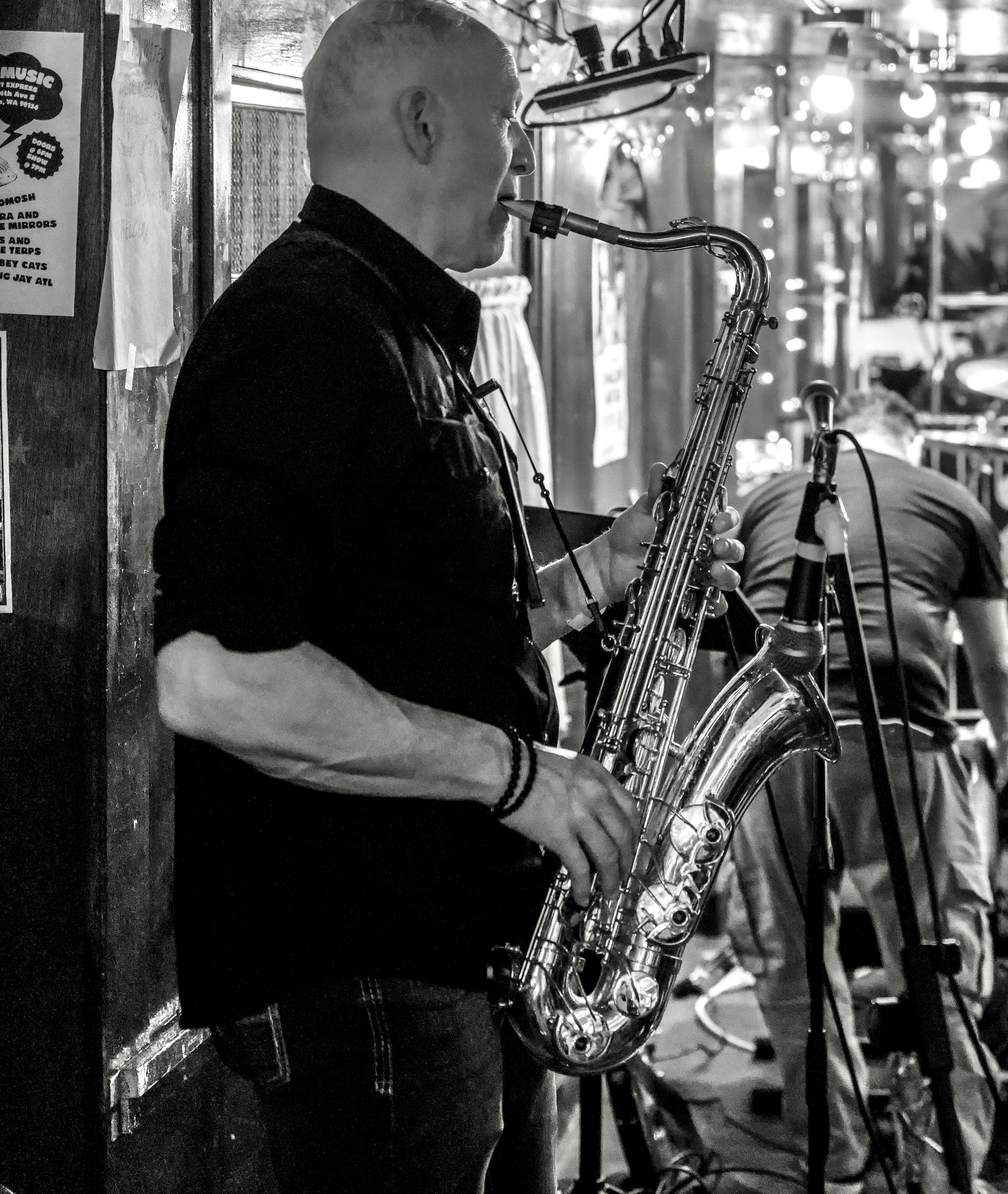 Slow Moving Bird saxophonist performing live